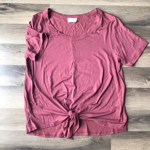 Scoop neck top with tie near belly button